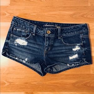 Distressed denim shorts